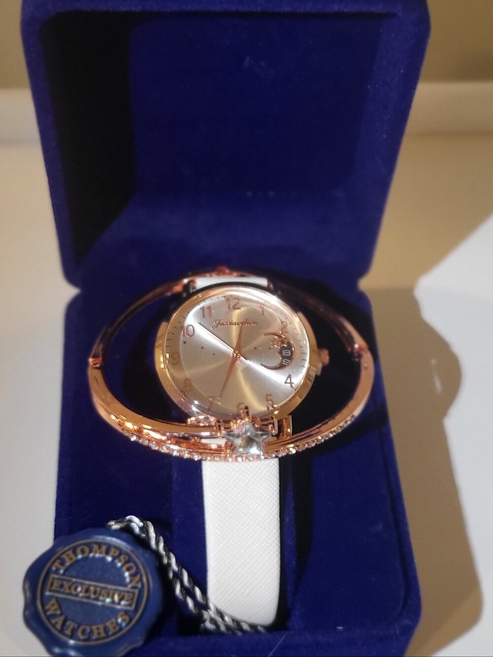 Rose Gold Dial Watch with White Strap With Rose Gold Accent Bracelet